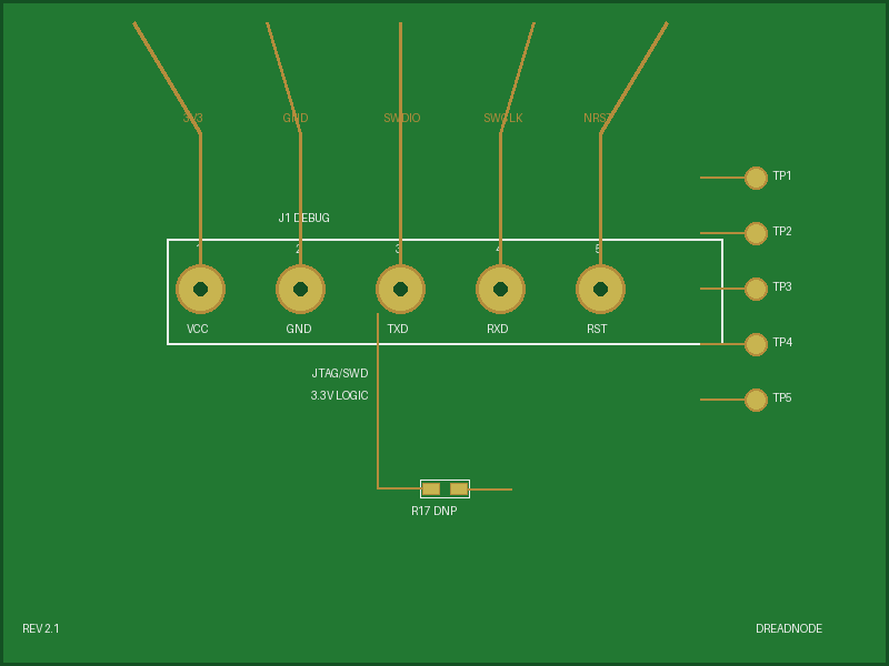 Closeup photograph of the debug-header area of the same IoT board, showing the exposed debug pads.